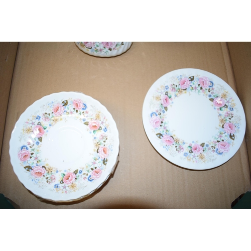 7 - Minton part tea service in the 'Rose Garland' pattern to include four cups four saucers and five sid... 