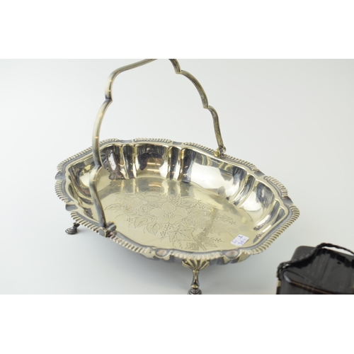 75 - A Baby Brownie with a silver plated basket, 26.5cm (2).