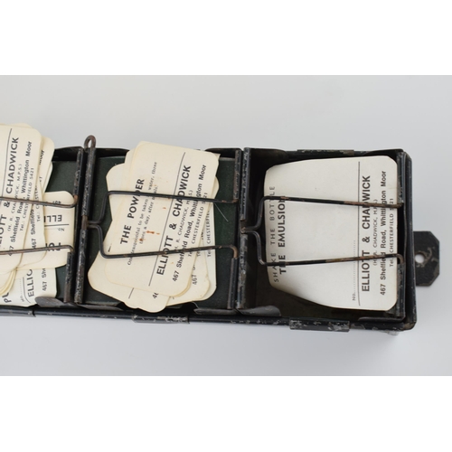 9 - Early 20th century 'The Alchemist Label Rack' with 6 sections for holding paper bottle labels, with ... 