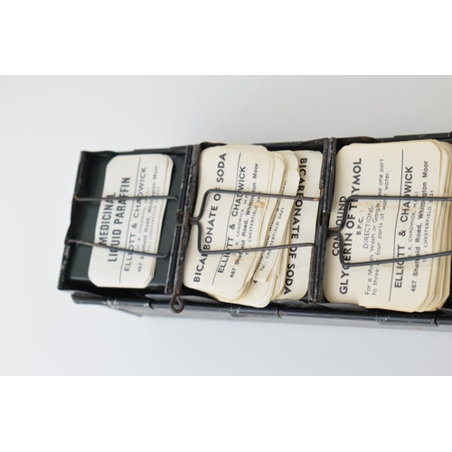 9 - Early 20th century 'The Alchemist Label Rack' with 6 sections for holding paper bottle labels, with ... 