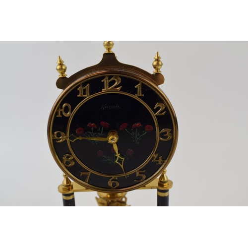 216 - An Anniversary clock by Kundo, Made in West Germany, brass base with hand-painted floral decoration ... 