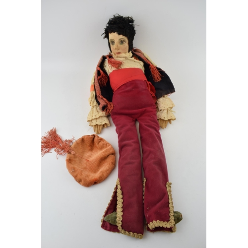 221 - A Boudoir doll in later handmade clothing. Height 70cm.