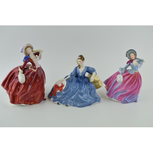 125 - Royal Doulton figures 'Autumn Breezes' H.N. 4716, 'Autumn Breezes' H.N. 1934 and 'Elyse' H.N. 2429. ... 