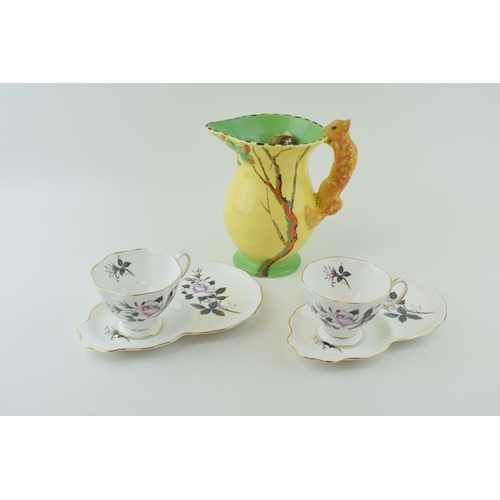 142 - A pair of Royal Albert 'Queens Messenger' cup and saucers. together with a Burleigh Ware jug. (3) He... 