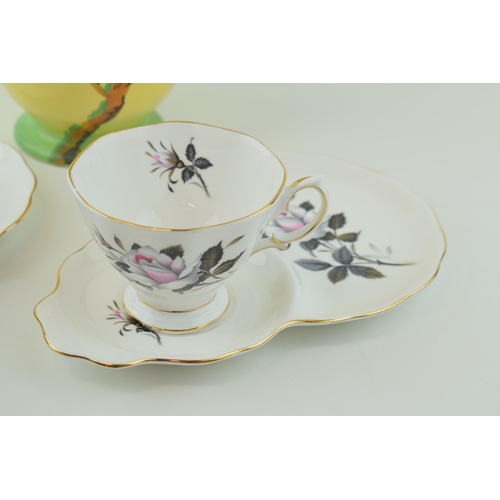 142 - A pair of Royal Albert 'Queens Messenger' cup and saucers. together with a Burleigh Ware jug. (3) He... 