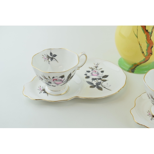 142 - A pair of Royal Albert 'Queens Messenger' cup and saucers. together with a Burleigh Ware jug. (3) He... 