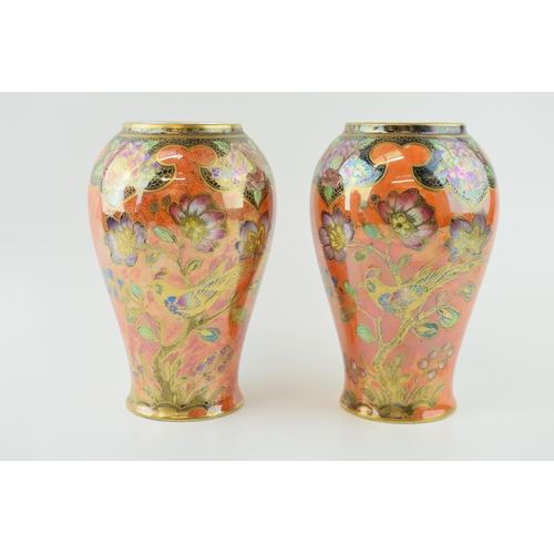 34 - A pair of Newhall Boumier Ware lustre vases, decorated with exotic birds amongst foliage, 20cm tall ... 