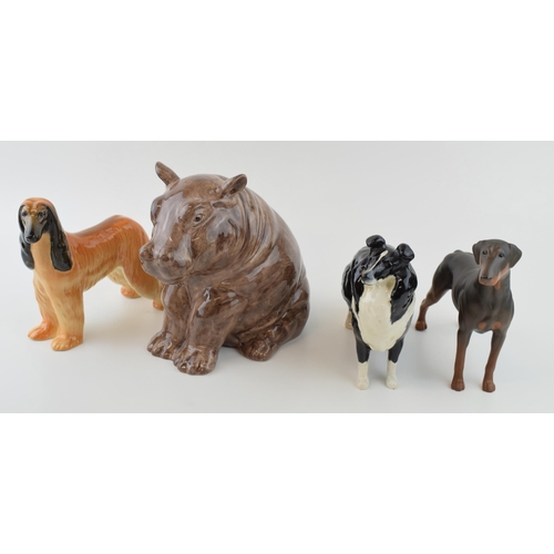 5 - A collection of Beswick dogs to include 'Hajubah of Davlen' Afgan Hound, 'Collie' and 'Doberman Pins... 