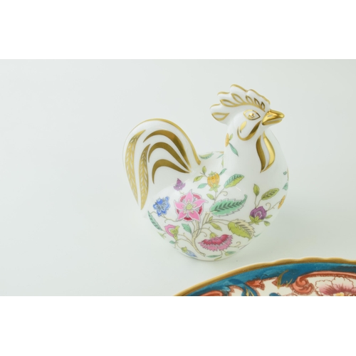 60 - A collection of ceramic items to include a Coalport 'Spaniel', a Minton 'Haddon Hall' Cockerel paper... 