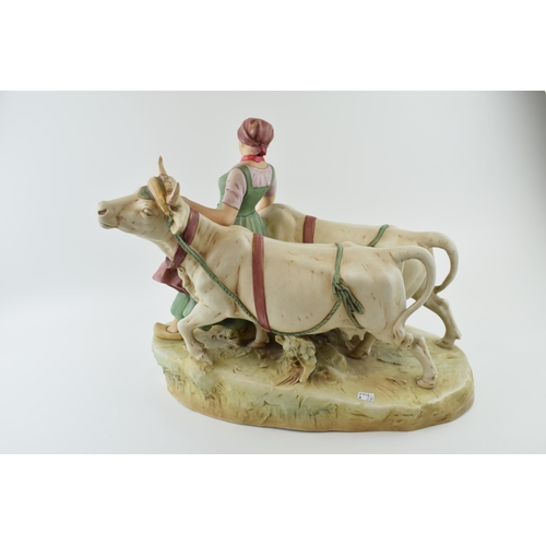 73 - Large Royal Dux figure of a Dutch girl with 2 cows (restored), 45cm long. Height 38cm.