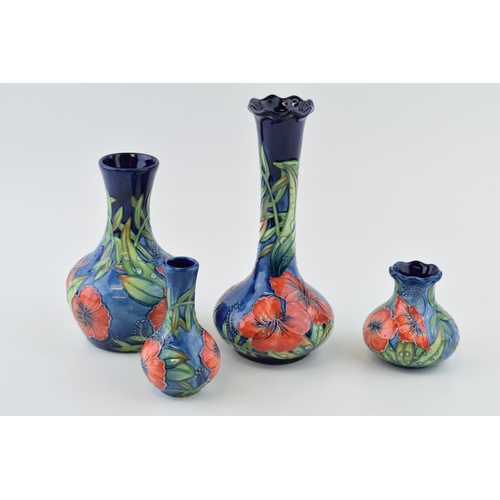 89 - Old Tupton Ware in the Poppy pattern to include four vases of varying heights and styles, 20.5cm tal... 