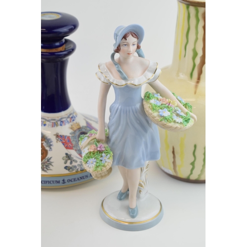 92 - A group of ceramic items to include a 'Royal Dux' figure of Girl With Baskets of Flowers, 'Radford' ... 