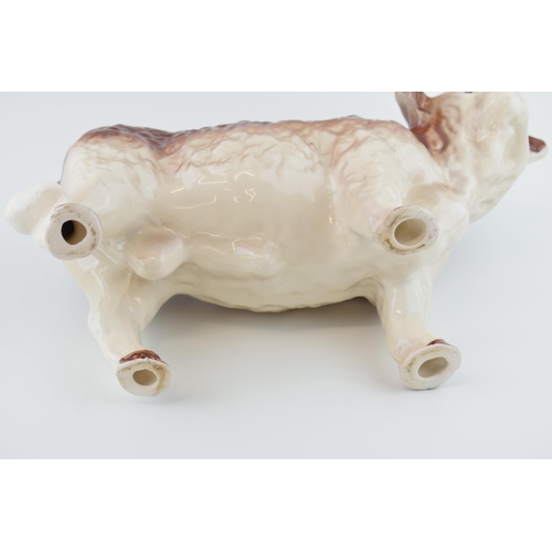 94 - A large mid 20th century butchers shop advertising figure of a Hereford Bull, with horns, 39cm long,... 