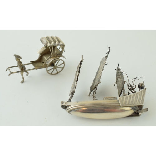 491 - Two white metal (possibly low grade silver) figures of a rickshaw and a galleon, 38.2g, (2).