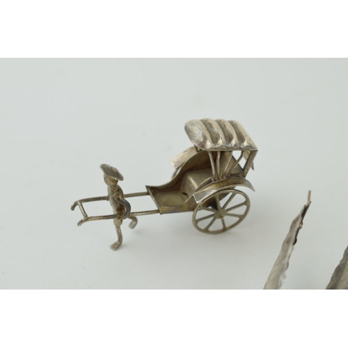 491 - Two white metal (possibly low grade silver) figures of a rickshaw and a galleon, 38.2g, (2).