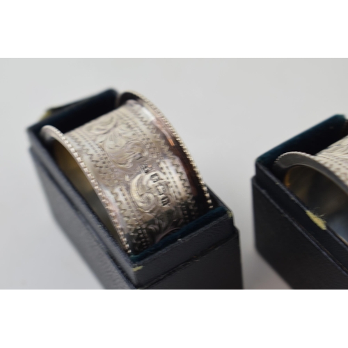 492 - Two cased silver napkin rings, Birmingham 1907, 30.4g (2).