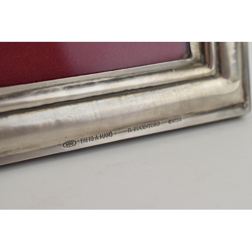 500 - Silver (800) fronted photo frame with bow and ribbon decoration, easel back, 33cm tall.