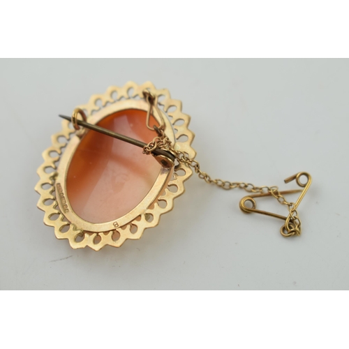 510 - 9ct gold cased cameo brooch with a female profile, metal pin and chain, 4.3g.