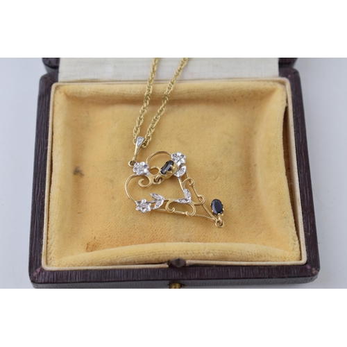 512 - 9ct gold pendant on 9ct gold chain, chain 45cm long, in associated period box, total 5.8g.