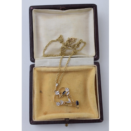 512 - 9ct gold pendant on 9ct gold chain, chain 45cm long, in associated period box, total 5.8g.