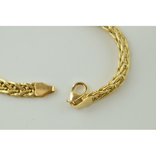 514 - 18ct yellow gold double link bracelet. Marked .750. Made in Italy. Length 18.5cm. Weight 6.7 grams.