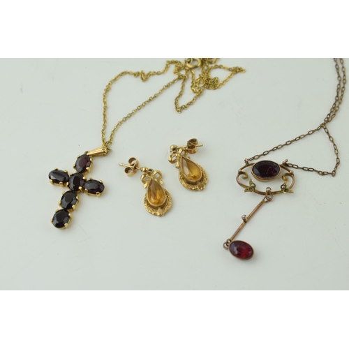 516 - A 9ct cross together with a pair of 9ct gold earrings and a 9ct gold drop pendant. Gross weight 11.8... 