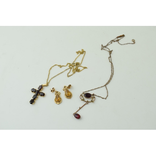 516 - A 9ct cross together with a pair of 9ct gold earrings and a 9ct gold drop pendant. Gross weight 11.8... 