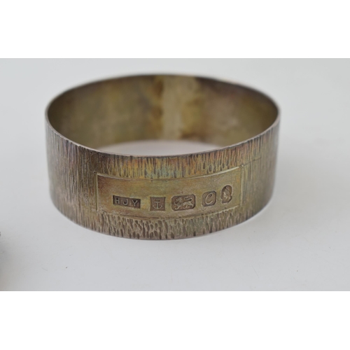 519 - A silver bark effect bangle with a similar bracelet, 69.5g, both hallmarked (2).