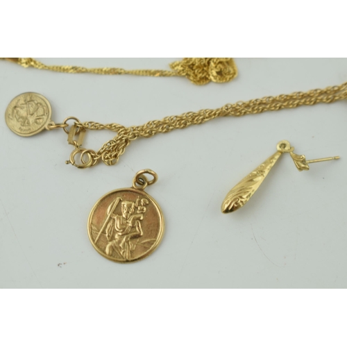 520 - A collection of 9ct gold items to include St Christoper's pendants, and necklaces. Weight 6.6 grams.