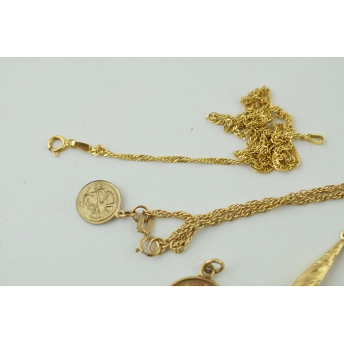 520 - A collection of 9ct gold items to include St Christoper's pendants, and necklaces. Weight 6.6 grams.