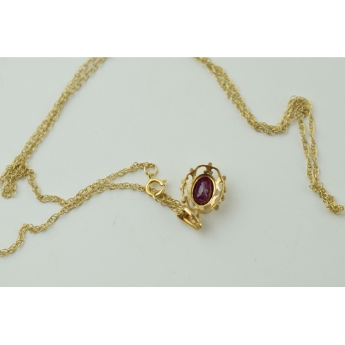 538 - 9ct gold chain and pendant, pink stone, 1.8g, chain 45cm long.