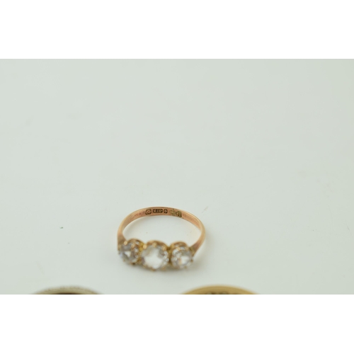 544 - A pair of 9ct gold rings, stone set, one eternity, 4.6g, with a silver and gold eternity ring (3).