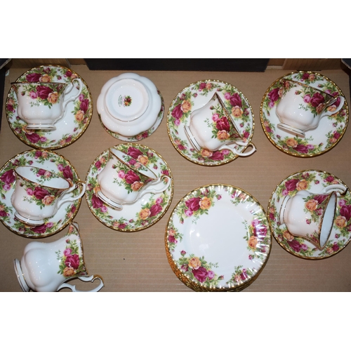 145 - A collection of Royal Albert Old Country Roses tea ware to include six trios, milk and sugar. All of... 