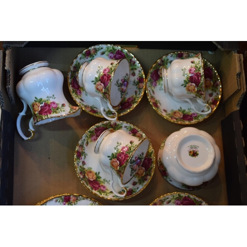 145 - A collection of Royal Albert Old Country Roses tea ware to include six trios, milk and sugar. All of... 