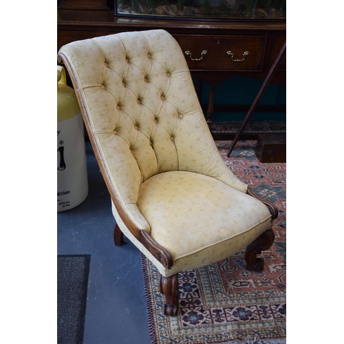 248 - Edwardian upholstered mahogany nursing chair, button back, scrolled front legs, 86cm tall.