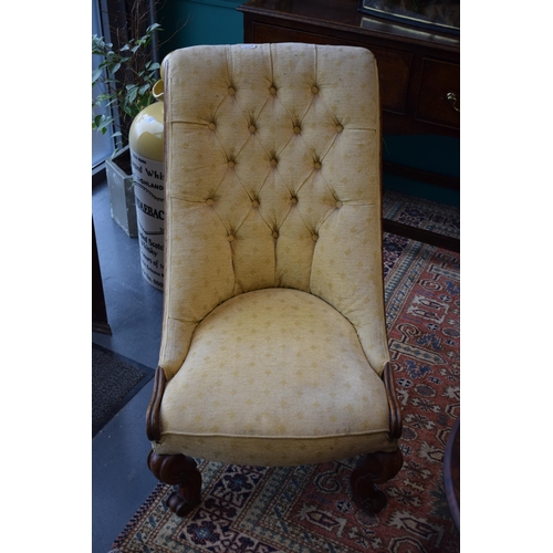 248 - Edwardian upholstered mahogany nursing chair, button back, scrolled front legs, 86cm tall.