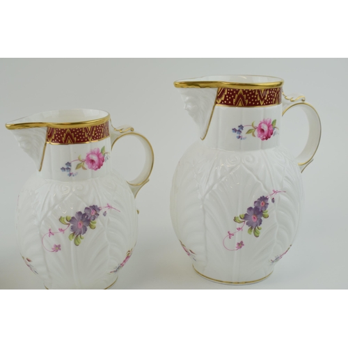 222 - A graduated set of four Coalport ewers, 'The Caughley Mask-Head Jug, bacchanalian design and floral ... 