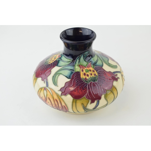 201 - Moorcroft squat vase in the Anna Lily vase, 13cm wide.