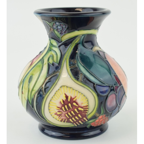 203 - Moorcroft vase in the Queens Choice design, 9.5cm tall.