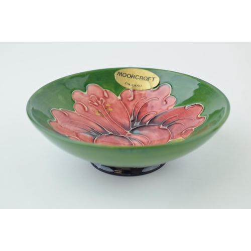 212 - Moorcroft Hibiscus on Green shallow bowl, 11cm wide.