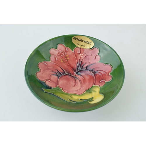 212 - Moorcroft Hibiscus on Green shallow bowl, 11cm wide.