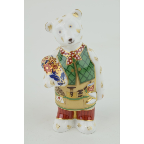 252 - Royal Crown Derby miniature bear paperweight, The Gardener (9cm), red printed marks to the base (Ple... 