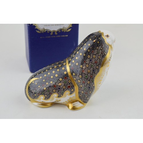 271 - Royal Crown Derby paperweight, Walrus, 11cm high, decorated In a kaleidoscopic patchwork of Japanese... 