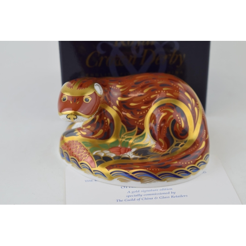 285 - Royal Crown Derby paperweight, Otter, a gold signature edition specially commissioned by The Guild o... 