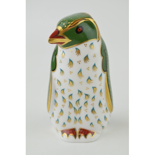 Royal Crown Derby paperweight, Harrods Rockhopper Penguin, in a distinctive Harrods green colourway, this is one of an exclusive limited edition of 950, gold stopper and red printed marks to the base.