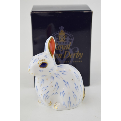 306 - Boxed Royal Crown Derby paperweight, Snowy Rabbit, date code for 2002 (MMII), 21st year special anni... 