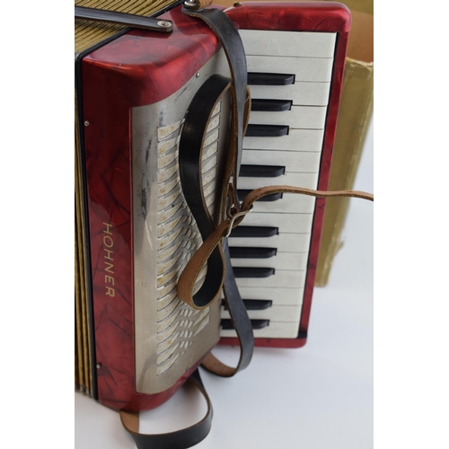 16 - Hohner 'Mignon II' mini accordion in original box. Width 29cm.