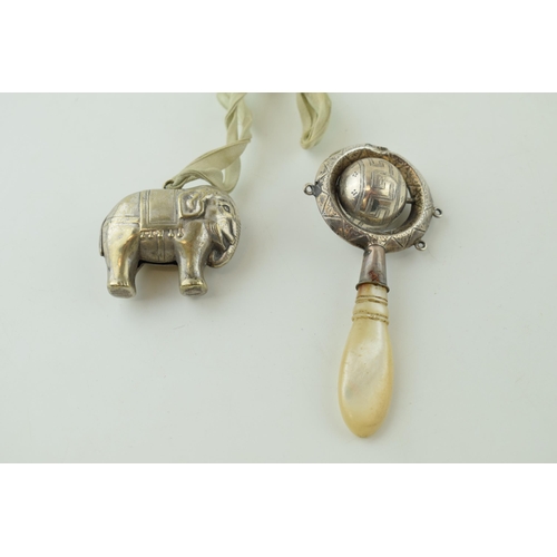 18 - A Mother of Pearl and white metal baby rattle with a plated elephant rattle (2).