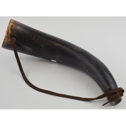 33 - A 20th century horn, with metal mouthpiece, made from horn with strap, 31cm long.