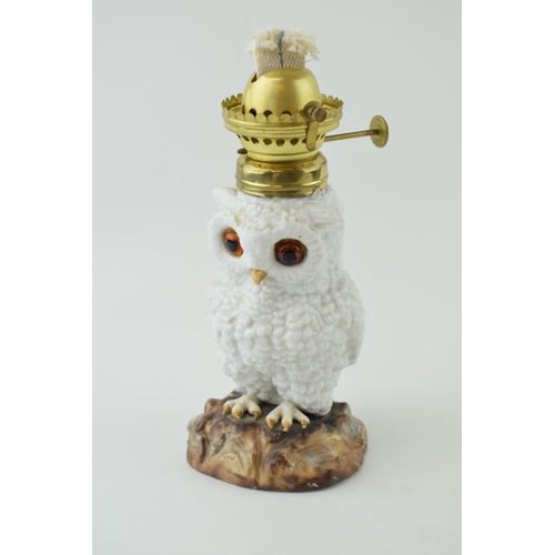 94A - 19th century continental porcelain oil lamp in the form of a standing owl, with glass eys, naturalis... 